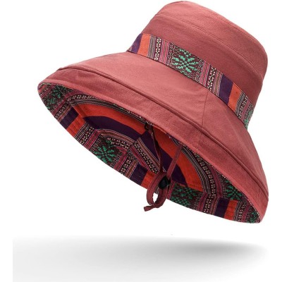 Women wearing wide brim sun hat with UPF 50+ protection at beach