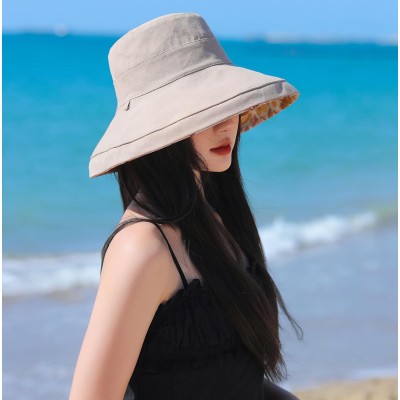 Wide brim sun hat for women with UPF protection, reversible and packable for beach and hiking