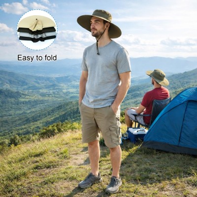 Man wearing super wide brim unisex bucket hat with UPF 50+ protection while fishing outdoors