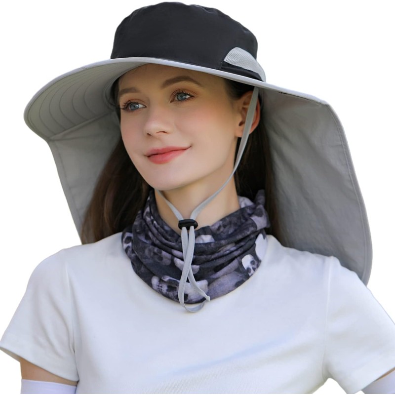 Woman wearing UPF 50+ sun hat with neck flap while hiking