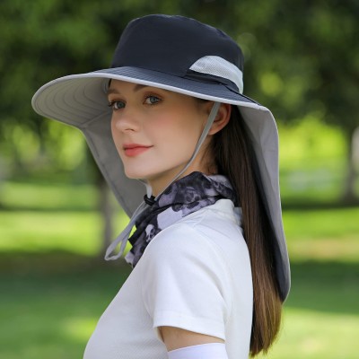 Woman wearing UPF 50+ sun hat with neck flap while hiking