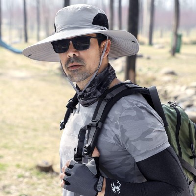 Men and women wearing wide brim bucket hat with UV protection and water repellent fabric for fishing hiking and beach