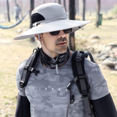 Men and women wearing wide brim bucket hat with UV protection and water repellent fabric for fishing hiking and beach