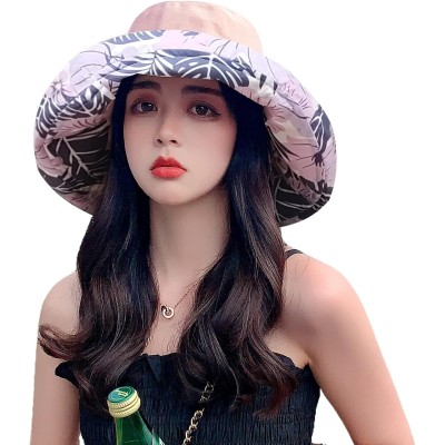 Women's reversible floral bucket sun hat with wide brim and UV protection