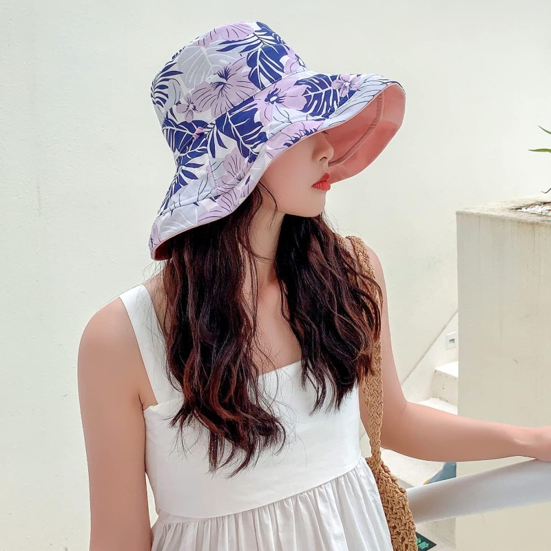 Women's reversible floral bucket sun hat with wide brim and UV protection