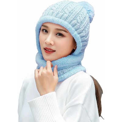 Woman wearing a fleece lined one piece beanie scarf in snowy winter scene