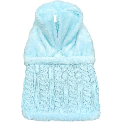 Woman wearing a fleece lined one piece beanie scarf in snowy winter scene