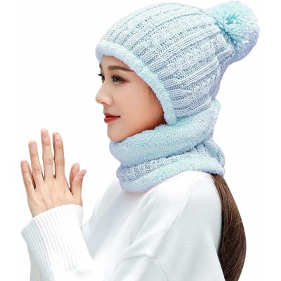 Woman wearing a fleece lined one piece beanie scarf in snowy winter scene