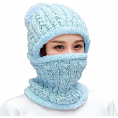 Woman wearing a fleece lined one piece beanie scarf in snowy winter scene