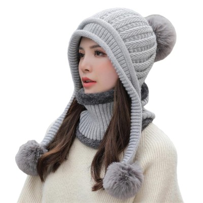 Women's Gray Winter Beanie Hat & Circle Scarf Set for Cold Weather Skiing Gray women's winter beanie and circle scarf set with fleece lined ear flaps, pom pom, ponytail-friendly for skiing