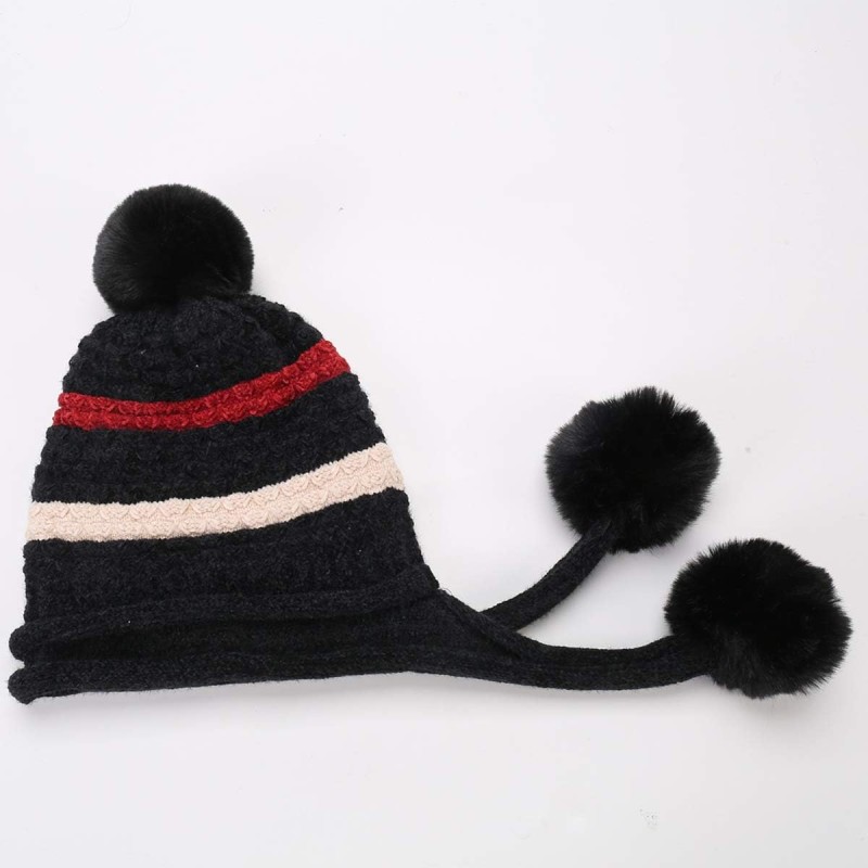 Black women’s Peruvian knit beanie with ear flaps, pom poms, fleece lining, ponytail friendly