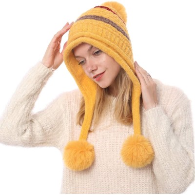 Women's Yellow Peruvian Winter Beanie Hat Yellow women's Peruvian beanie with ear flaps and pom poms