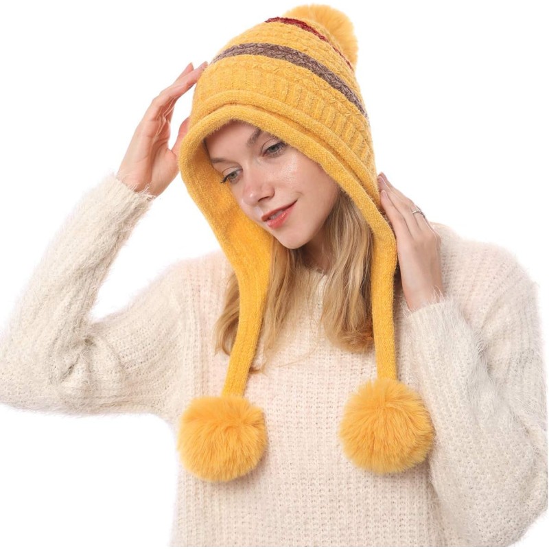 Women's Yellow Peruvian Winter Beanie Hat Yellow women's Peruvian beanie with ear flaps and pom poms