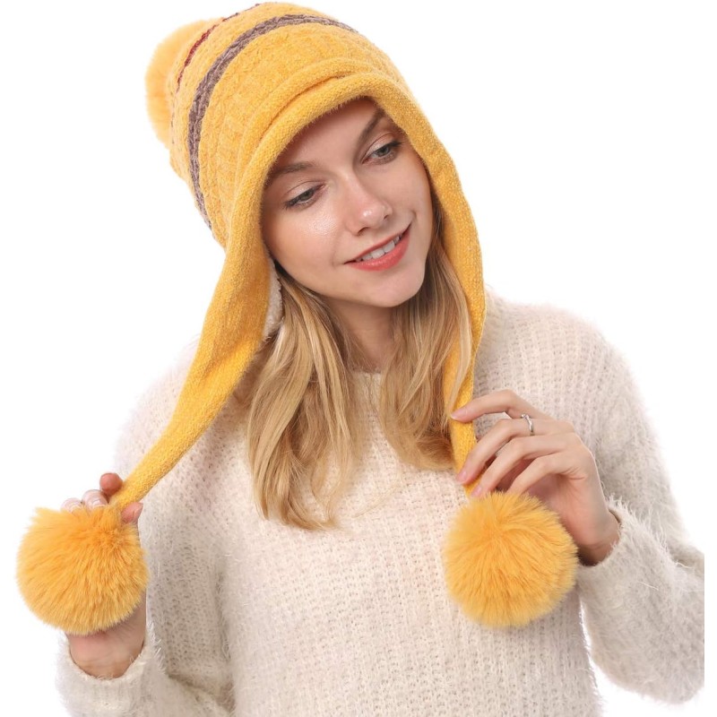Women's Yellow Peruvian Winter Beanie Hat Yellow women's Peruvian beanie with ear flaps and pom poms