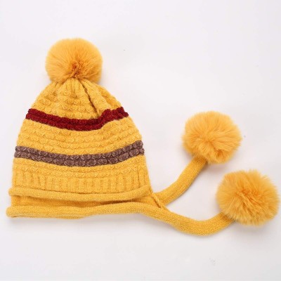 Women's Yellow Peruvian Winter Beanie Hat Yellow women's Peruvian beanie with ear flaps and pom poms