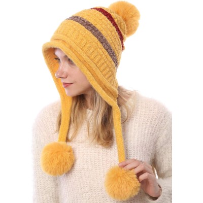 Women's Yellow Peruvian Winter Beanie Hat Yellow women's Peruvian beanie with ear flaps and pom poms