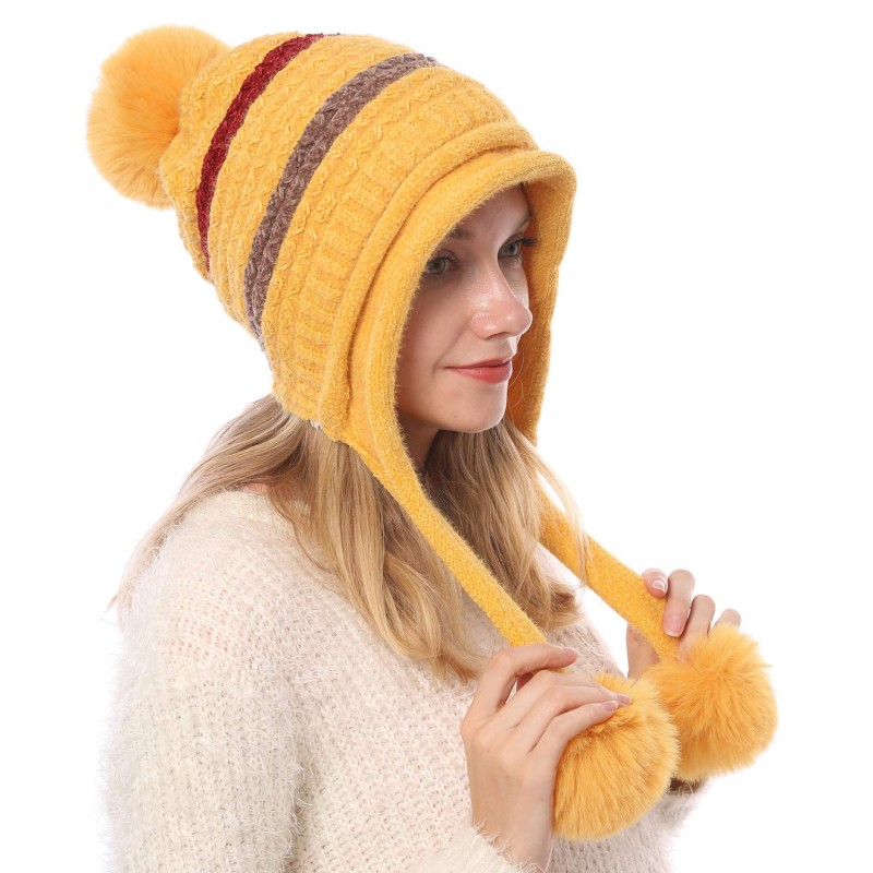 Women's Yellow Peruvian Winter Beanie Hat Yellow women's Peruvian beanie with ear flaps and pom poms