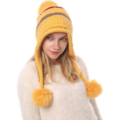 Women's Yellow Peruvian Winter Beanie Hat Yellow women's Peruvian beanie with ear flaps and pom poms