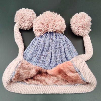 Light gray women’s Peruvian winter ski beanie with ear flaps, 3 pom poms, fleece lining, ponytail friendly