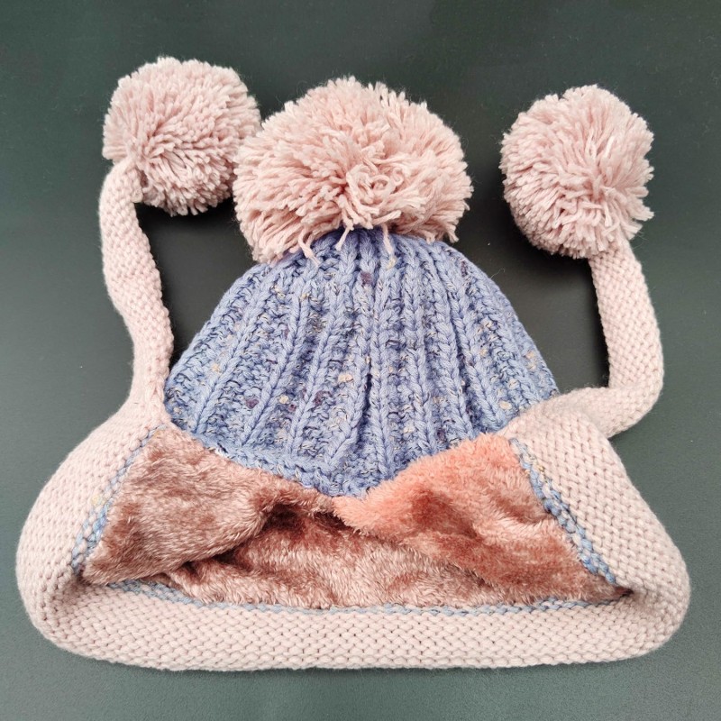 Light gray women’s Peruvian winter ski beanie with ear flaps, 3 pom poms, fleece lining, ponytail friendly