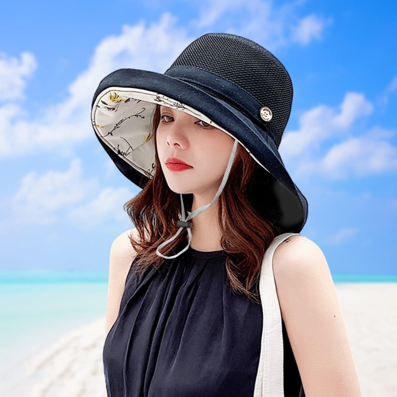Women's wide brim sun hat with UV protection, mesh crown, wired brim, and chin strap for beach, hiking, and travel