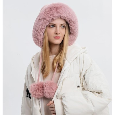 Women's pink Peruvian beanie with fleece lining, pom poms and ear flaps