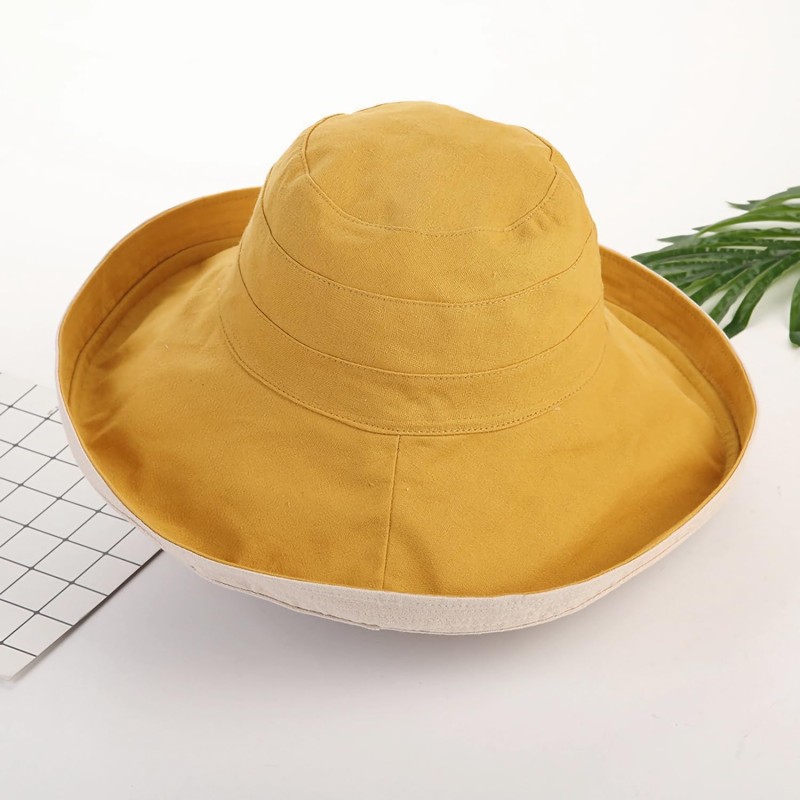 Women's yellow wide brim reversible sun hat with wired edge and chin strap