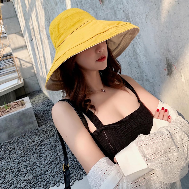 Women's yellow wide brim reversible sun hat with wired edge and chin strap