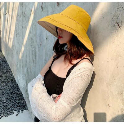 Women's yellow wide brim reversible sun hat with wired edge and chin strap