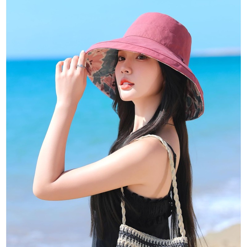 Reversible Packable Women's Wide Brim Sun Hat for Summer Use Women's reversible wide brim sun hat with UV protection for summer outdoor activities