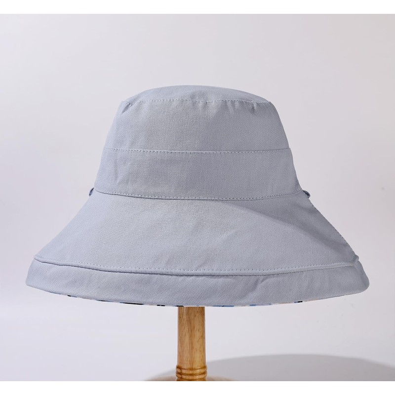 Women’s wide brim reversible sun hat with UV protection for summer outdoor activities