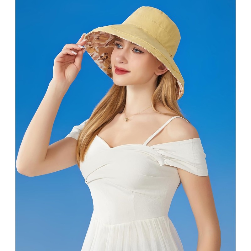 Women's wide brim sun hat with UV protection, reversible and packable for beach, fishing, hiking
