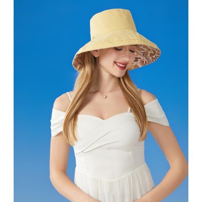 Women's wide brim sun hat with UV protection, reversible and packable for beach, fishing, hiking