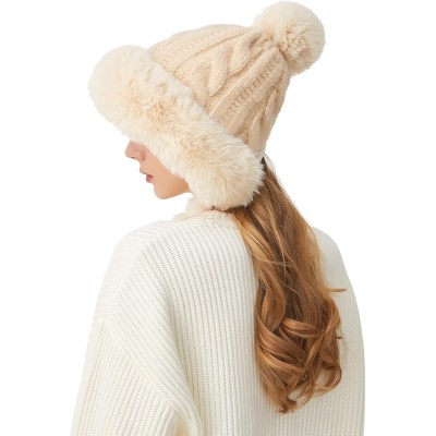 HUAMULAN Women's Beige Sherpa Lined Winter Beanie Ear Flap Pom Pom HUAMULAN women's beige winter beanie with sherpa lining, ear flaps, pom pom and ponytail opening