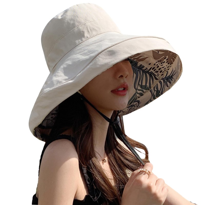 Women's Reversible Wide Brim Sun Hat - UV Protection Women wearing reversible wide brim sun hat with wired edge for UV protection
