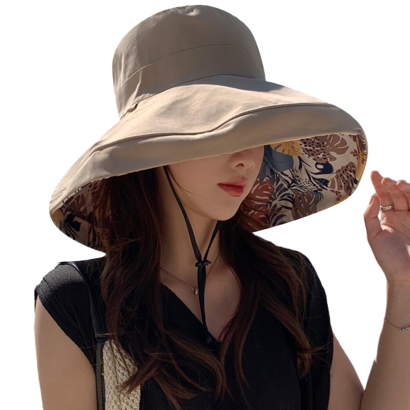 Women's reversible wide brim sun hat with UV protection, packable for travel and beach