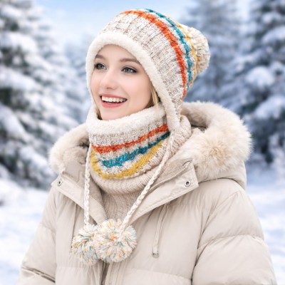 Women wearing fleece-lined winter beanie and circle scarf set with ear flaps and pompom