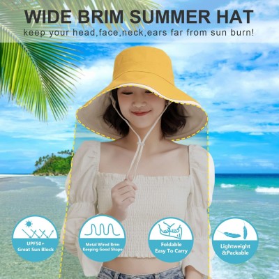 Women's Foldable Reversible Sun Hat Woman wearing a wide brim sun hat with UV protection