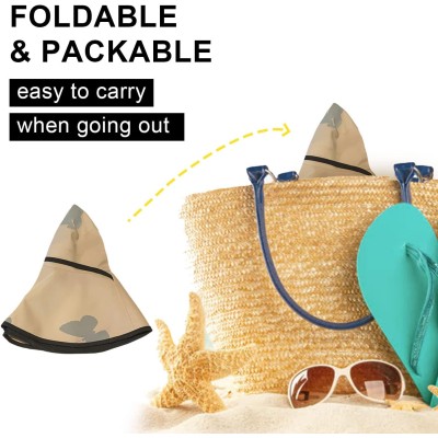 Women's Foldable Reversible Sun Hat Woman wearing a wide brim sun hat with UV protection