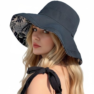Women's Reversible Wide Brim Sun Hat – UV Protection & Foldable Beach Hat Women wearing a reversible wide brim sun hat with UV protection at the beach