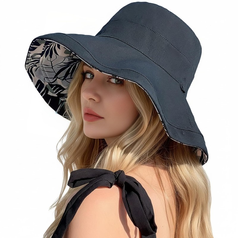 Women's Reversible Wide Brim Sun Hat – UV Protection & Foldable Beach Hat Women wearing a reversible wide brim sun hat with UV protection at the beach